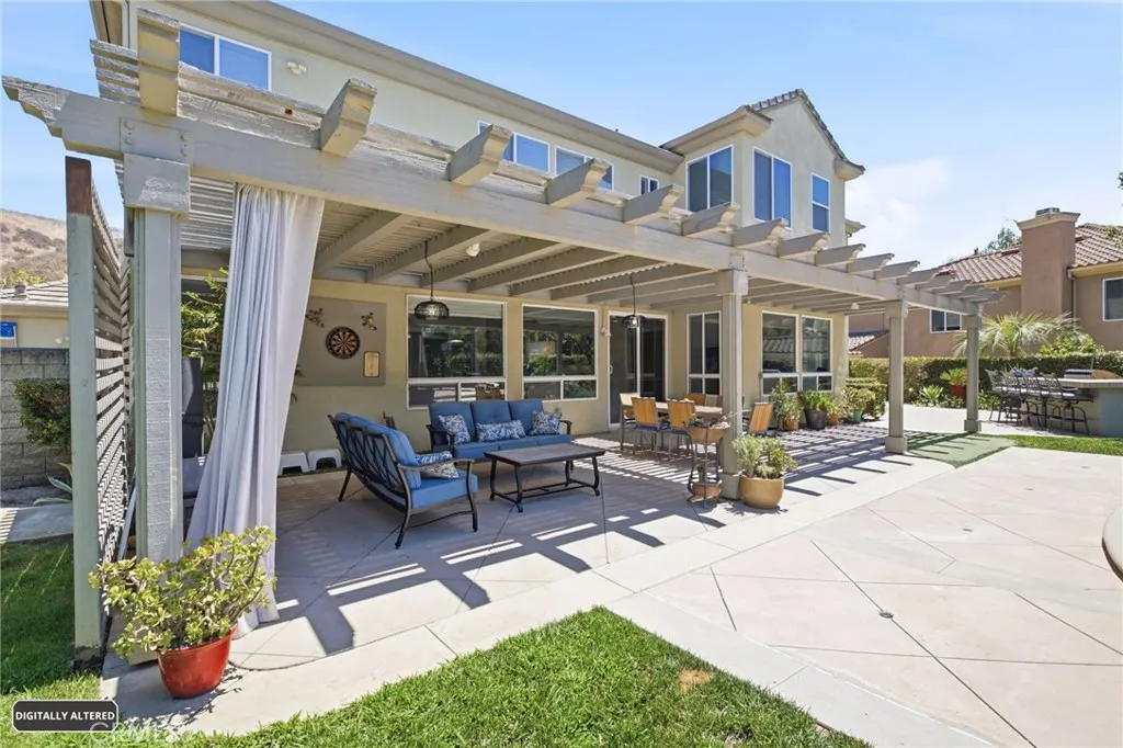 There is also a side yard to the left with included storage shed