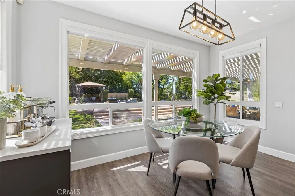Adjoining eat-in kitchen area with beautiful views of the backyrd