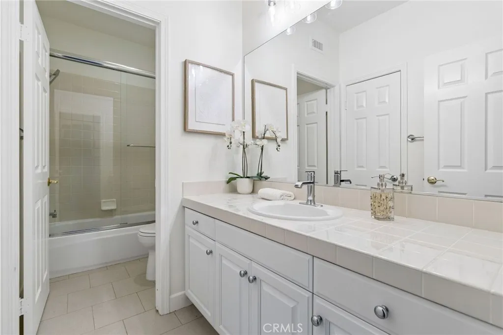 Fourth full bathroom. This one is upstairs connected to the 4th bedroom