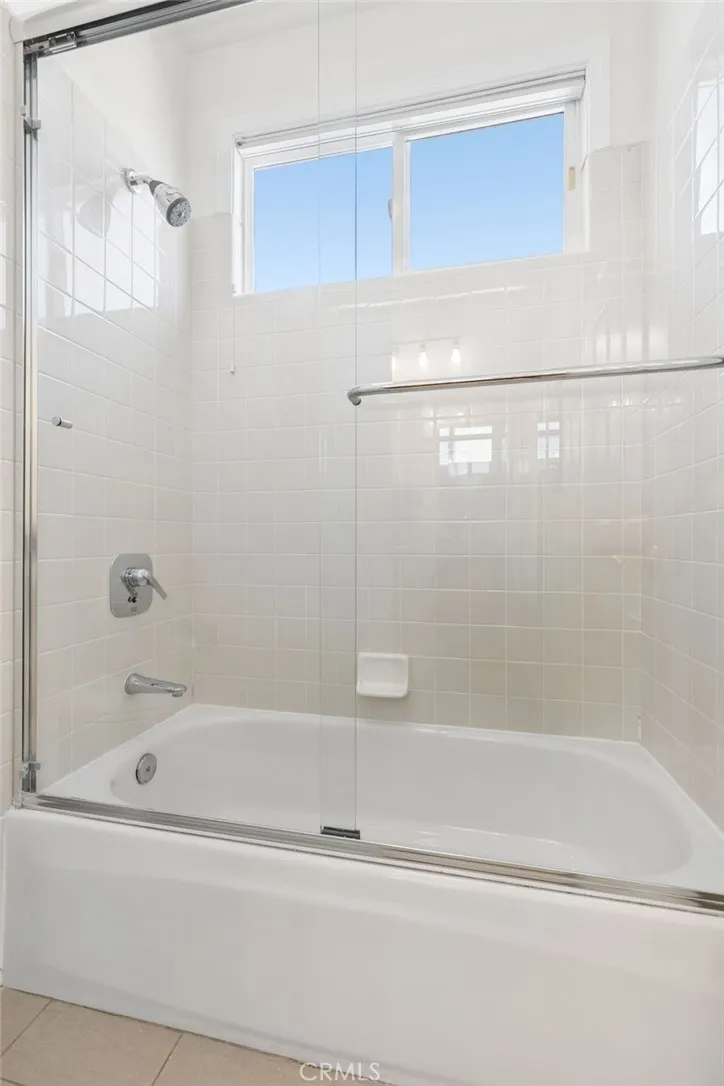 Offering a separate vanity area from the toilet and tub/shower room