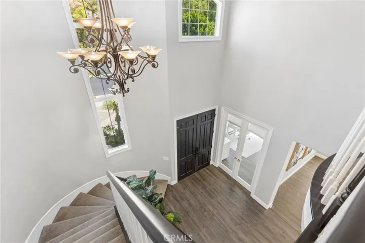 Head up the grand staircase to 4 more bedrooms, plus a large loft