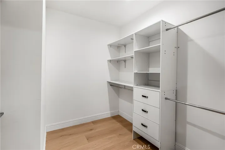 WALK IN CLOSET IN PRIMARY BEDROOM