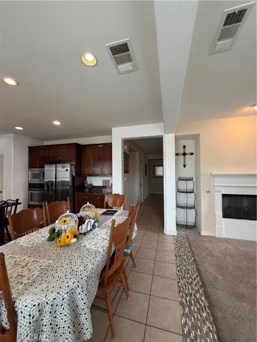 Kitchen Area to hallway leading to Bonus/Den and all bedrooms and bathrooms