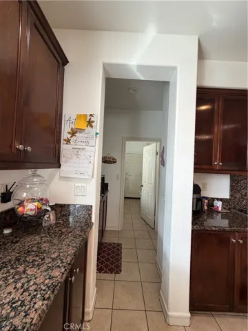 View from Kitchen to Butlers Pantry then to Laundry Room to door to the Garage