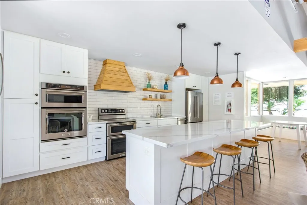The newly remodeled clubhouse (2) includes beautiful, vaulted ceiling, natural light flooding and large island including seating. The newly remodeled clubhouse (2) includes beautiful, vaulted ceiling, natural light flooding and large island including seating.