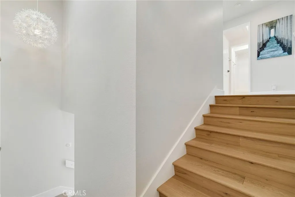 Upstairs stairway into bedrooms and bathroom. Upstairs stairway into bedrooms and bathroom.