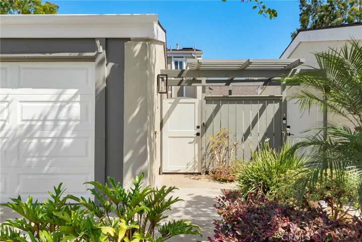 Side entry gate to main entry of home.