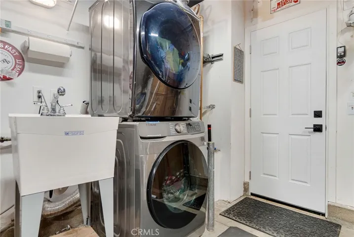 In garage washer and dryer and utility sink.