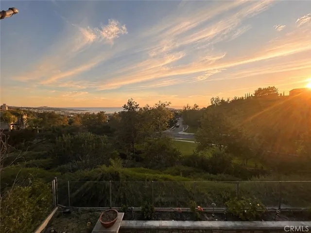 sunset views from the second-floor balcony