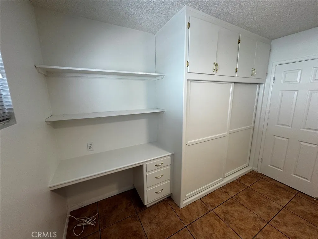 Closet Two with a desk.
