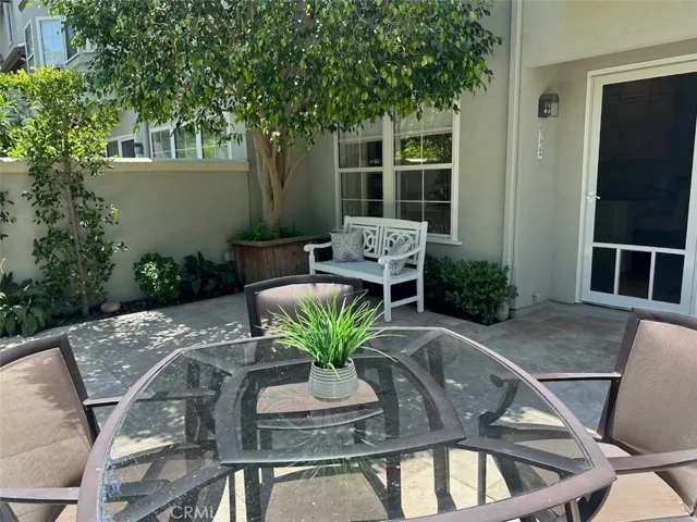 Brown Jorden Table and Chairs included on Patio