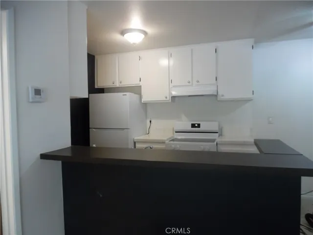 Kitchen with Seating at Bar