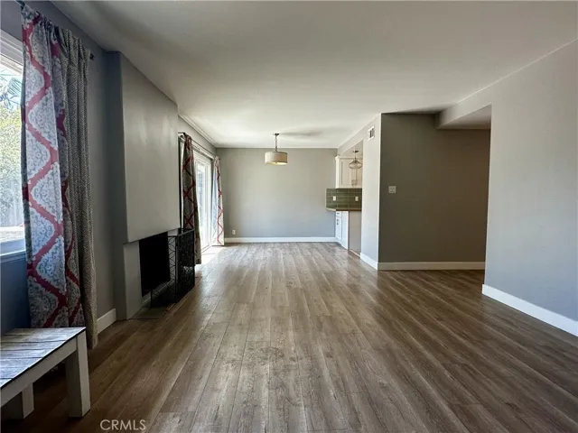 Direct view from living room to dining room area.