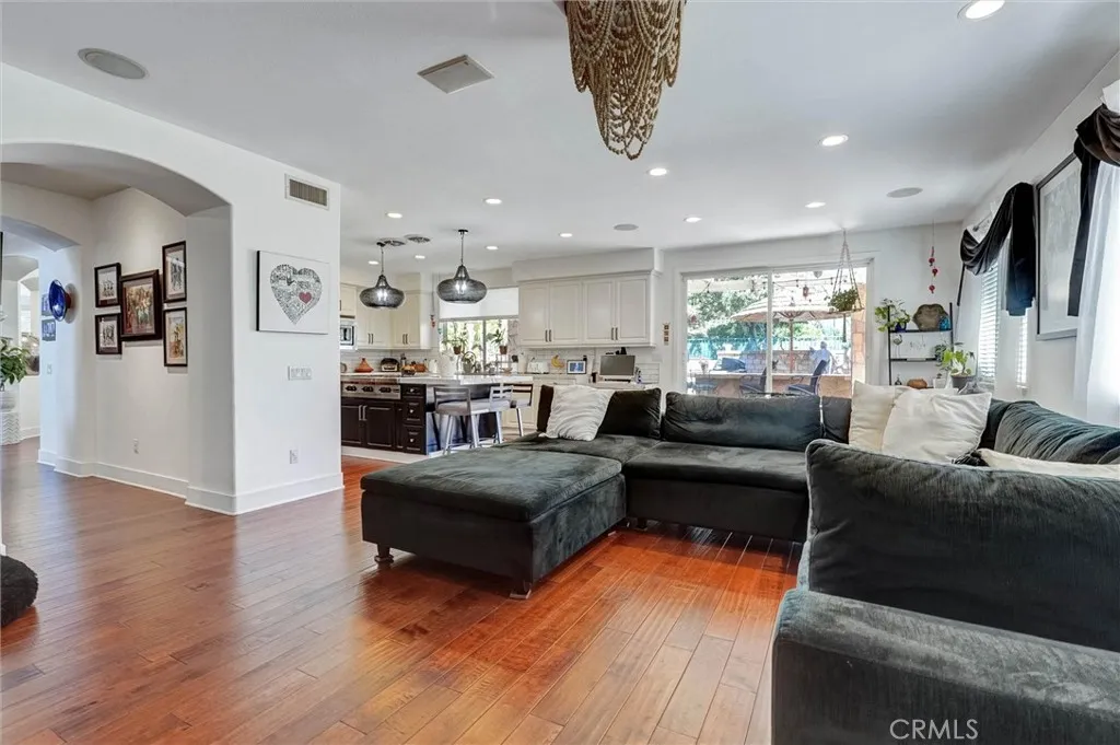 family room  and entrance to downstairs bedroom, laundry room and garage.