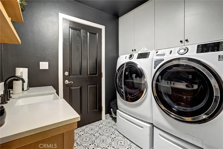 Laundry room area and garage access.