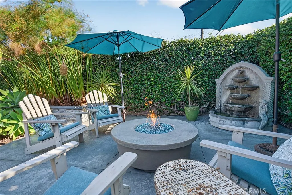 Pull up a chair and enjoy the fire pit.  Gas line is piped into the fire pit.