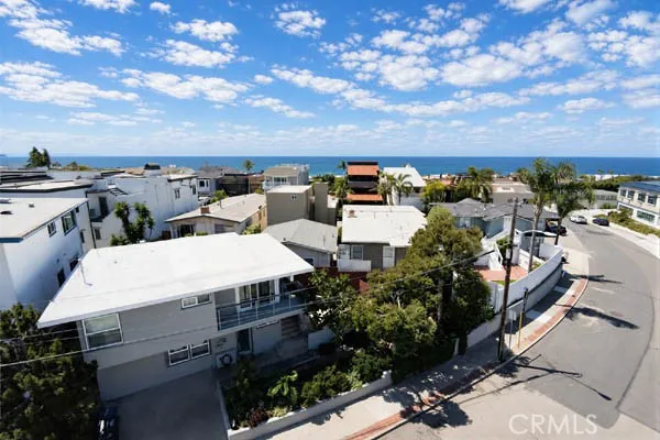 Rare opportunity for a beach close turn-key condition duplex