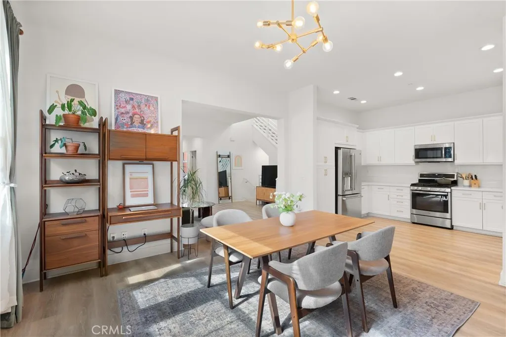 Kitchen opens into the dining room. Kitchen opens into the dining room.
