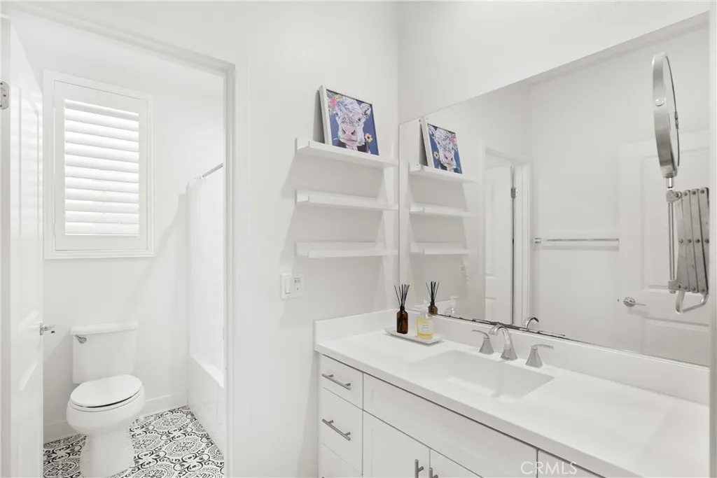 Hallway bathroom with shower and bathtub on the 2nd floor across from the laundry room. Hallway bathroom with shower and bathtub on the 2nd floor across from the laundry room.