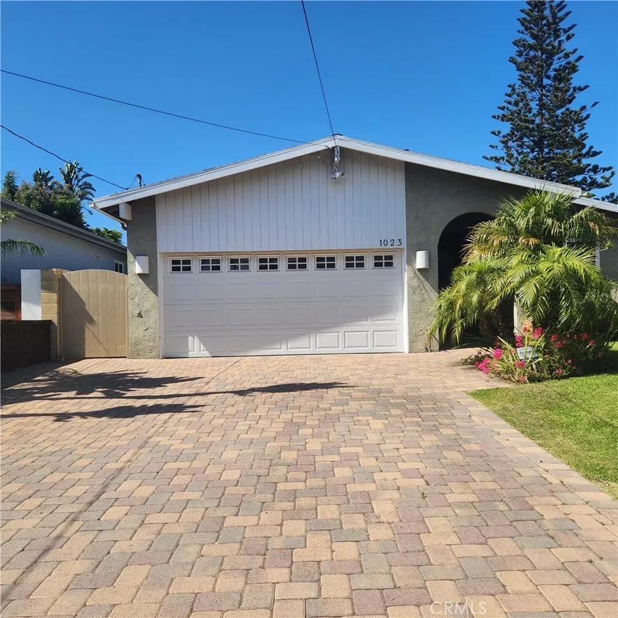 Exterior - facing 8th Street with plenty of off street driveway parking and 2 car garage