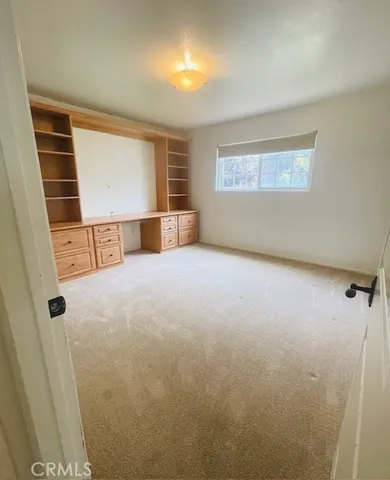 2nd bedroom with built-ins. Perfect for home office or homework area
