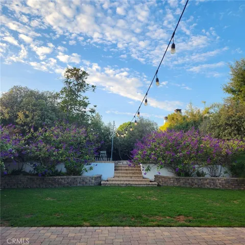 Huge, landscaped and private backyard with patio area for dining