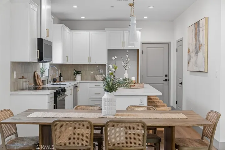 Photos are of the same model/floor plan at a different location and are for illustrative purposes only. Actual finishes, features, and options may vary.