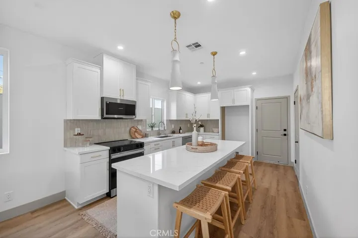 Photos are of the same model/floor plan at a different location and are for illustrative purposes only. Actual finishes, features, and options may vary.