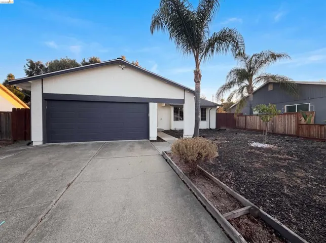 Crisp exterior finish with a contrasting garage door