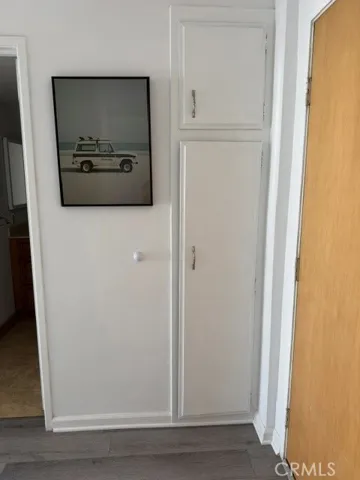More storage behind entry door
