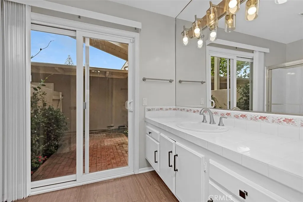 2nd Vanity with Commode, Walk in Shower and Courtyard 2nd Vanity with Commode, Walk in Shower and Courtyard