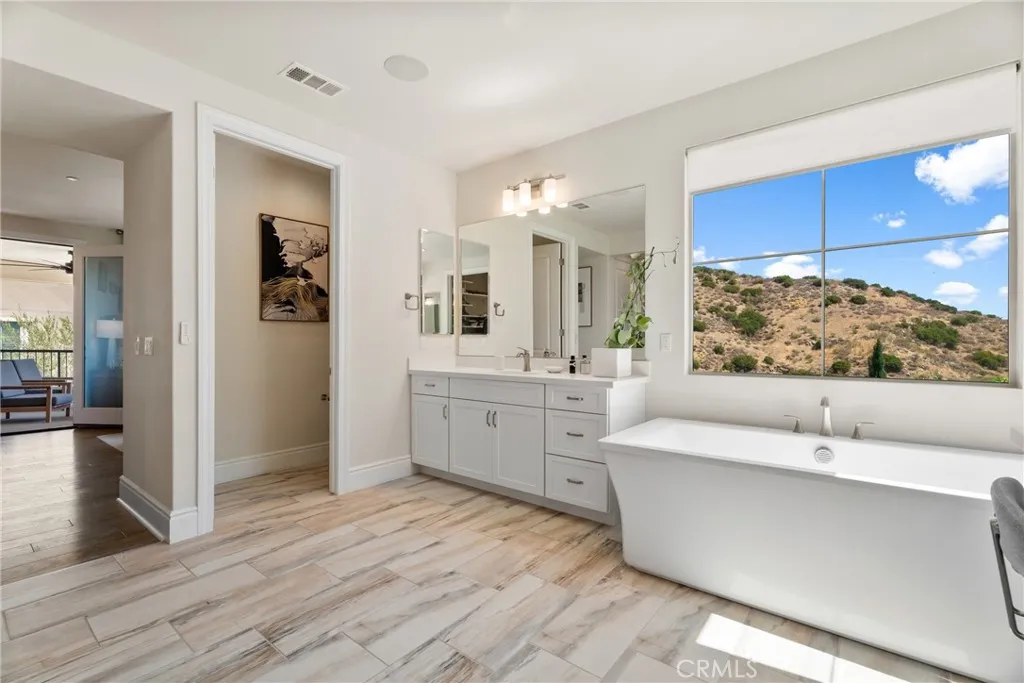 Master bathroom from closet 1