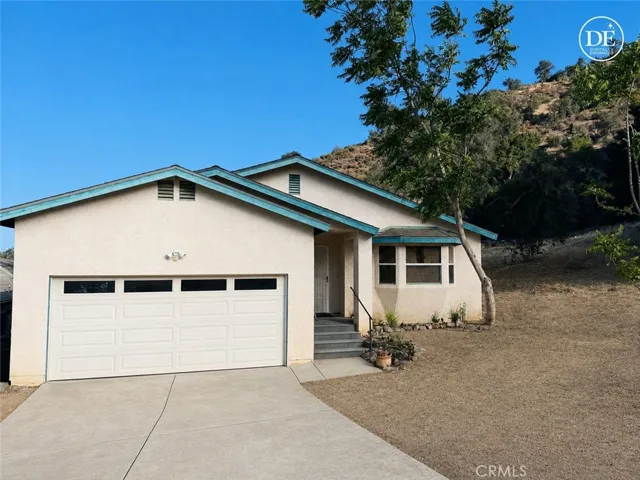 House is uniquely placed at bottom of hills