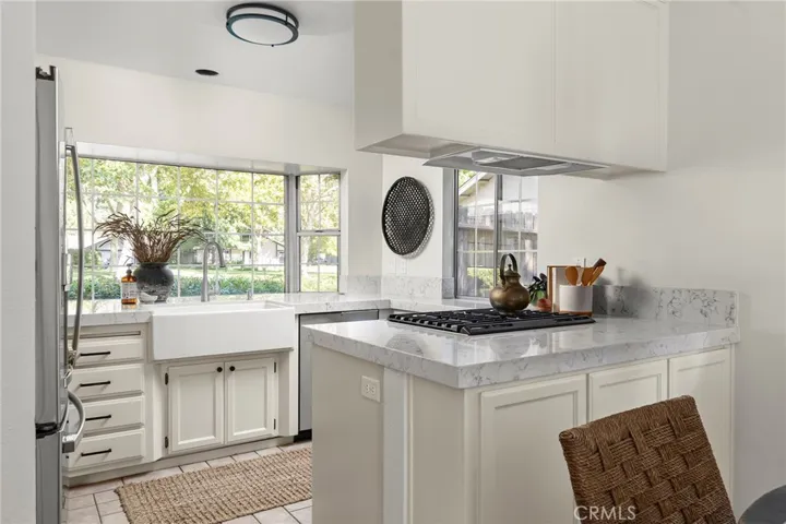 Beautifully remodeled kitchen with large bay window
