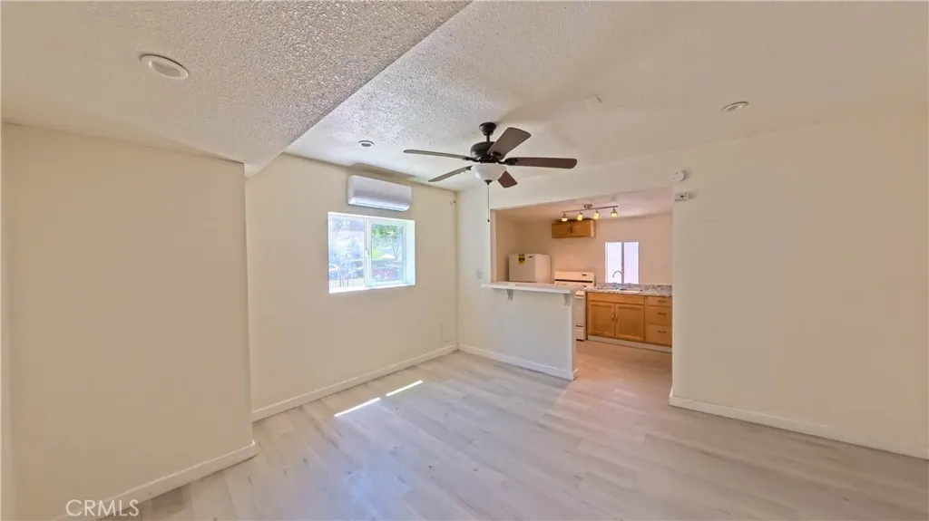 Comfortable living area within the detached studio ADU.