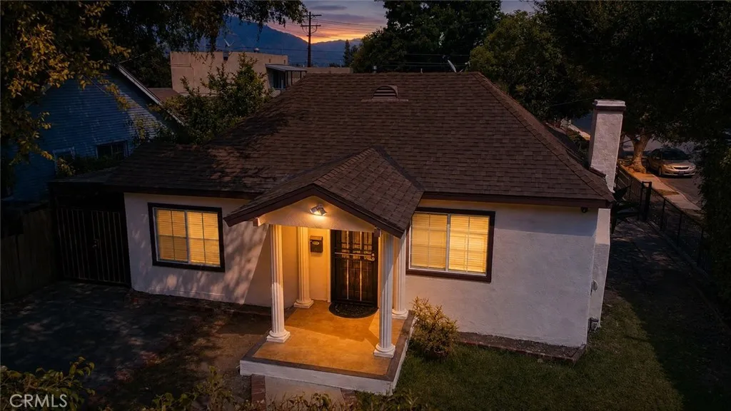 Beautiful twilight exterior highlights the home’s inviting character.