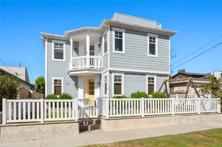 Towering neighborhood presence with sunshine, gated front yard and tons of charm.