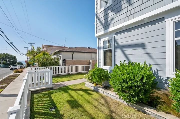 Ocean views from fenced-in front yard