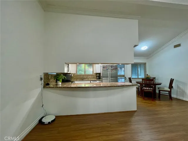 Living Room to Dining Room and Kitchen