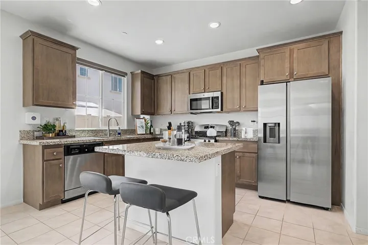Bright and inviting breakfast nook with ample natural light, perfect for morning coffee.