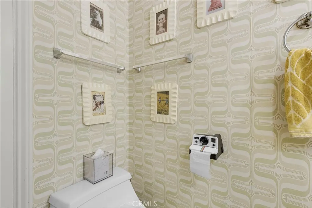 Whimsical toilet roll holder