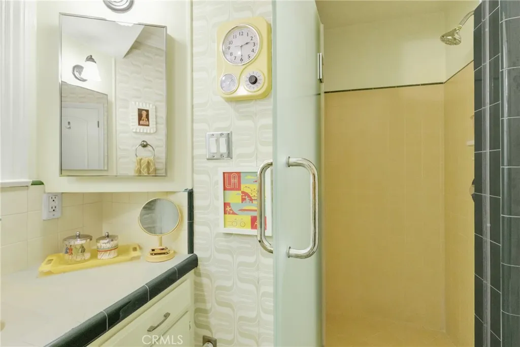 Bathroom with carefully selected vintage wallpaper