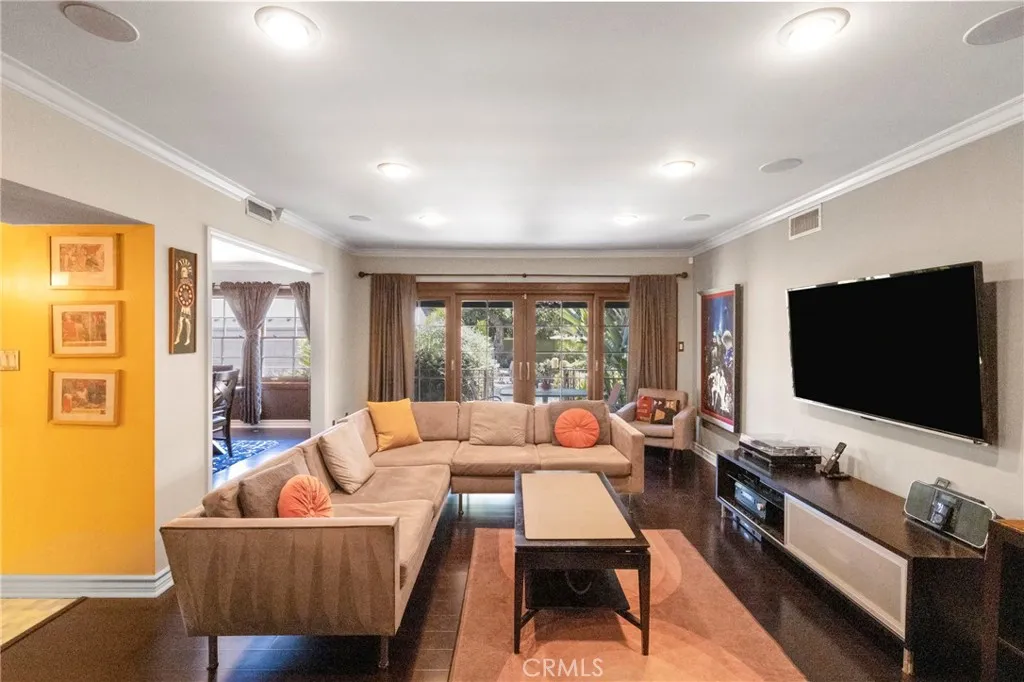 Spacious living room with recessed lighting
