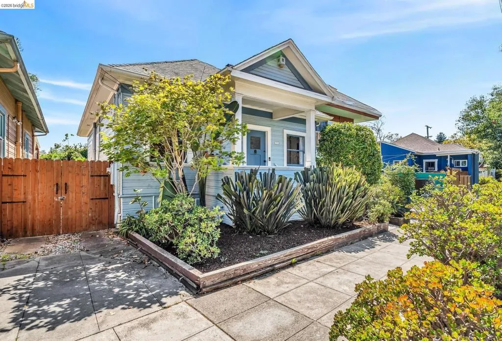 Craftsman-style exterior with light blue siding