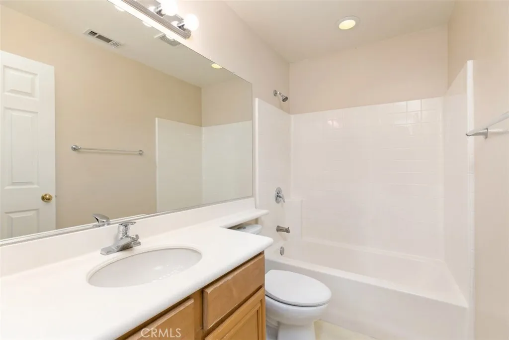 Upstairs hallway bathroom, with shower over tub, and single faucet/sink. Upstairs hallway bathroom, with shower over tub, and single faucet/sink.