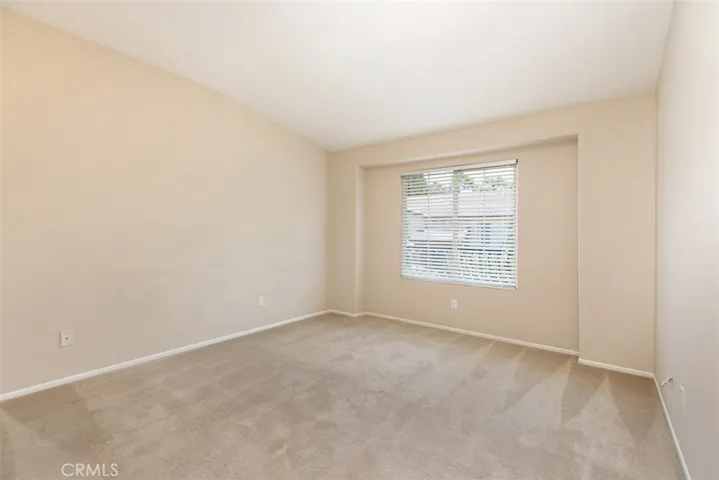 Secondary bedroom. *flooring to be updated with LVP prior to move-in.