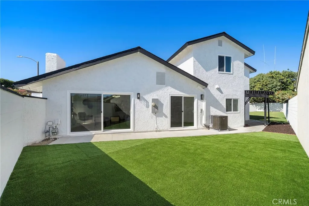 Outdoors, enjoy a wrap-around, park-like backyard with 2 separate patio areas.