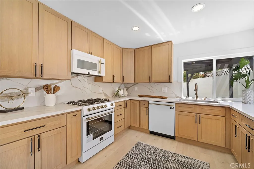 Remolded Kitchen has plenty of cabinet and  counter space, turnkey!