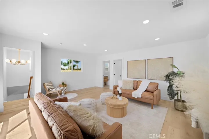 This exceptional second-level retreat also offers 2 bedrooms, 1 with a walk-in closet, plus a beautifully appointed full bathroom with tub/shower combination.