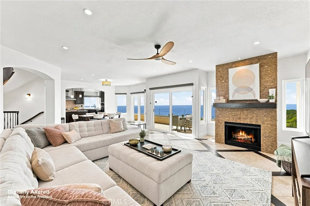 Open living flows into dining & kitchen with sweeping ocean views Open living flows into dining & kitchen with sweeping ocean views